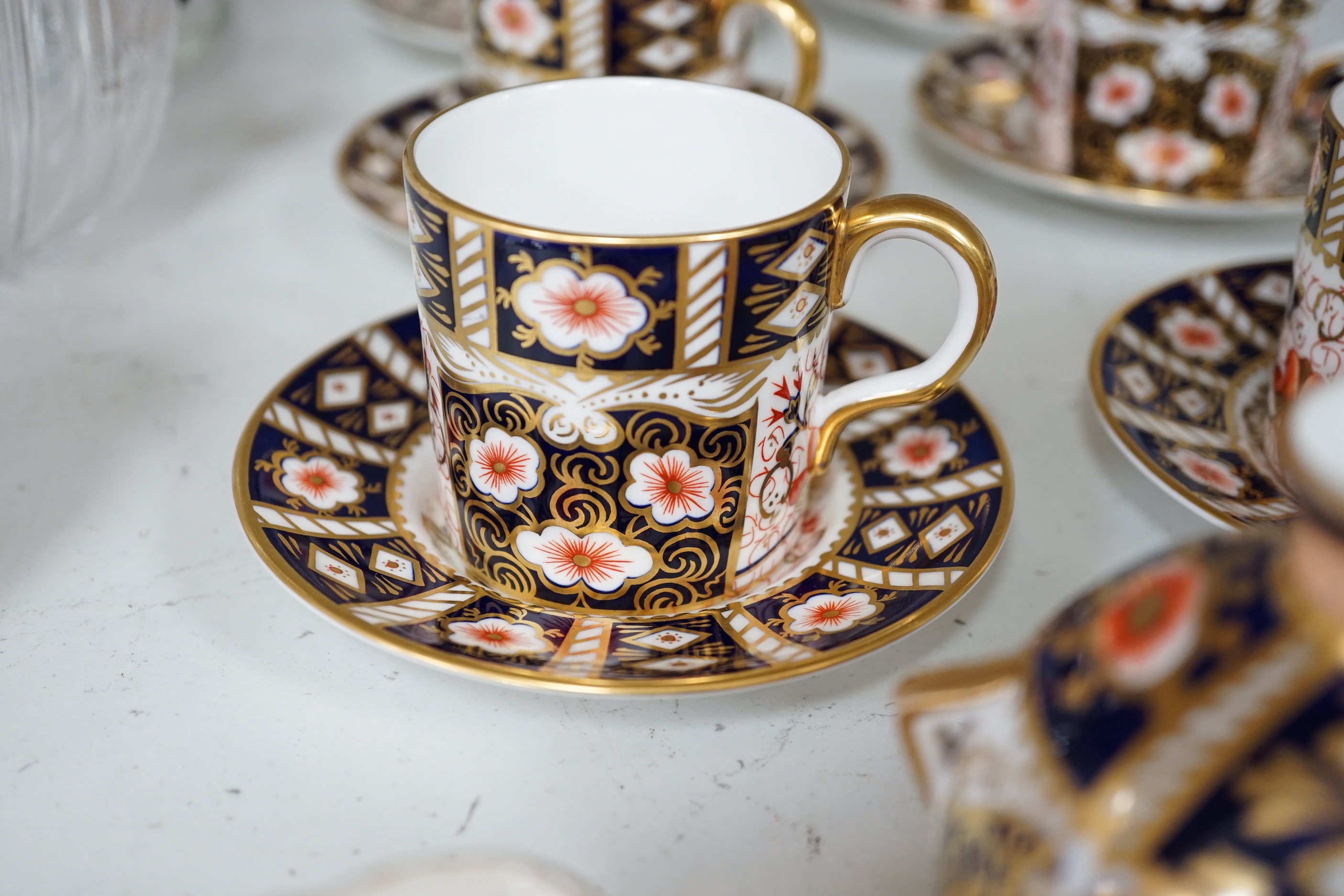 A quantity of items including two glass carafes, glass biscuit barrel, metal box, a Royal Crown Derby coffee set, etc (14)